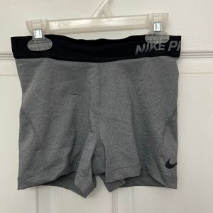 Gray and Black Nike Pros